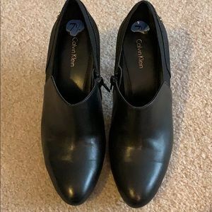 Black leather slip on booties